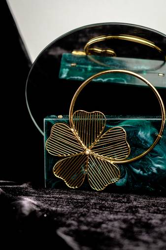 Green embroidered clutch