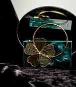 Green embroidered clutch