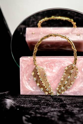 Pink embroidered clutch