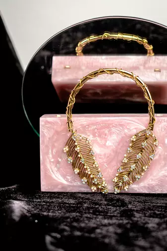 Pink embroidered clutch