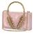 Pink embroidered clutch