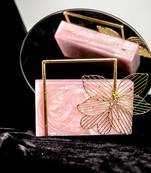 Baby pink embroidered clutch