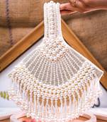 White embroidered pouch bag