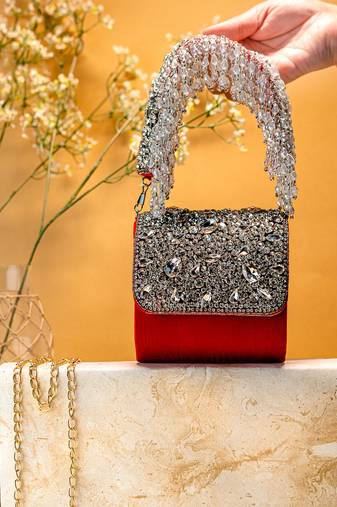 Red stone embroidered clutch