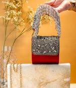 Red stone embroidered clutch