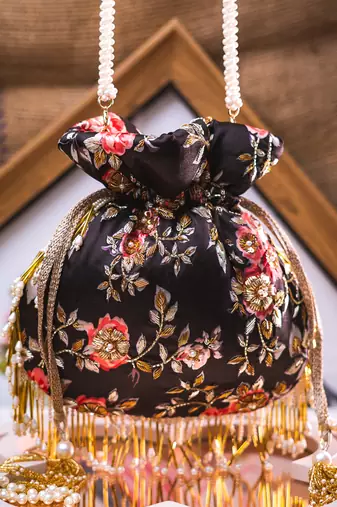 Black floral embroidered potli bag
