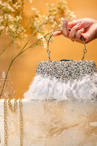 White stone embroidered clutch