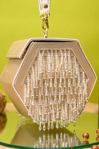 Beige embroidered clutch