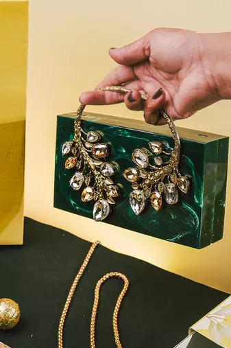 Dark green stone clutch