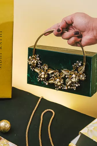 Dark green stone clutch