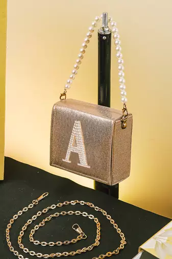 Gold customised 'a' synthetic clutch