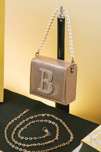 Gold customised 'b' synthetic clutch