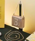 Gold customised 'b' synthetic clutch