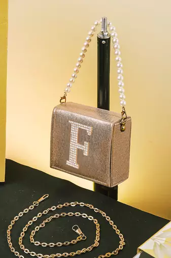 Gold customised 'f' synthetic clutch