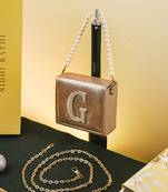 Gold customised 'g' synthetic clutch