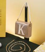 Gold customised 'k' synthetic clutch