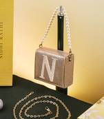 Gold customised 'n' synthetic clutch