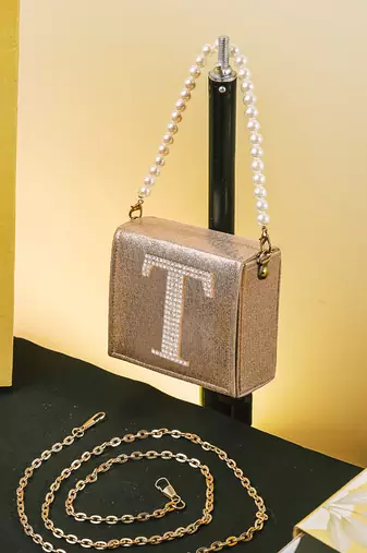 Gold customised 't' synthetic clutch