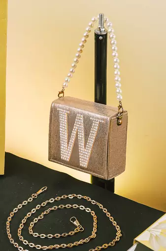 Gold customised 'w' synthetic clutch
