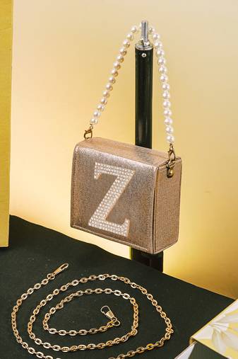 Gold customised 'z' synthetic clutch