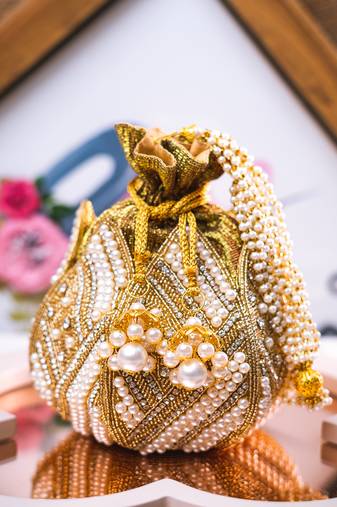 White pearl embroidered potli bag