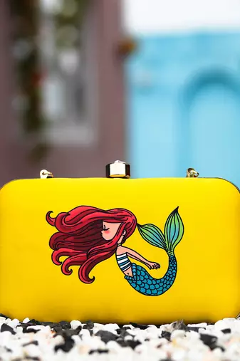 Yellow printed clutch