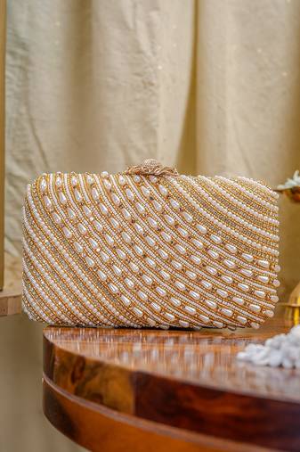 Gold beads embroidered clutch