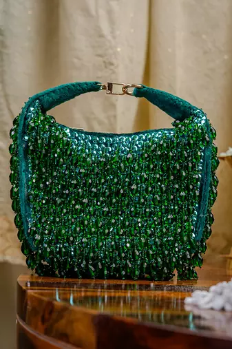 Green beads embroidered clutch