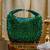 Green beads embroidered clutch