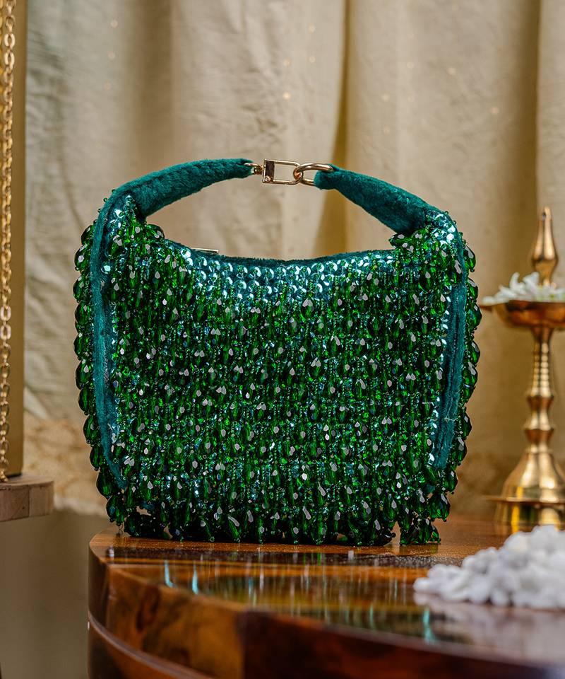 Green beads embroidered clutch