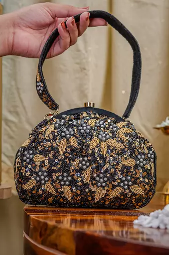 Black floral embroidered clutch