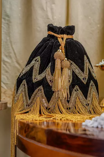 Black floral embroidered potli bag