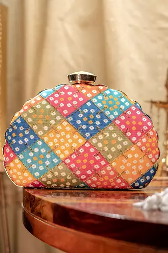 Blue geometric printed clutch