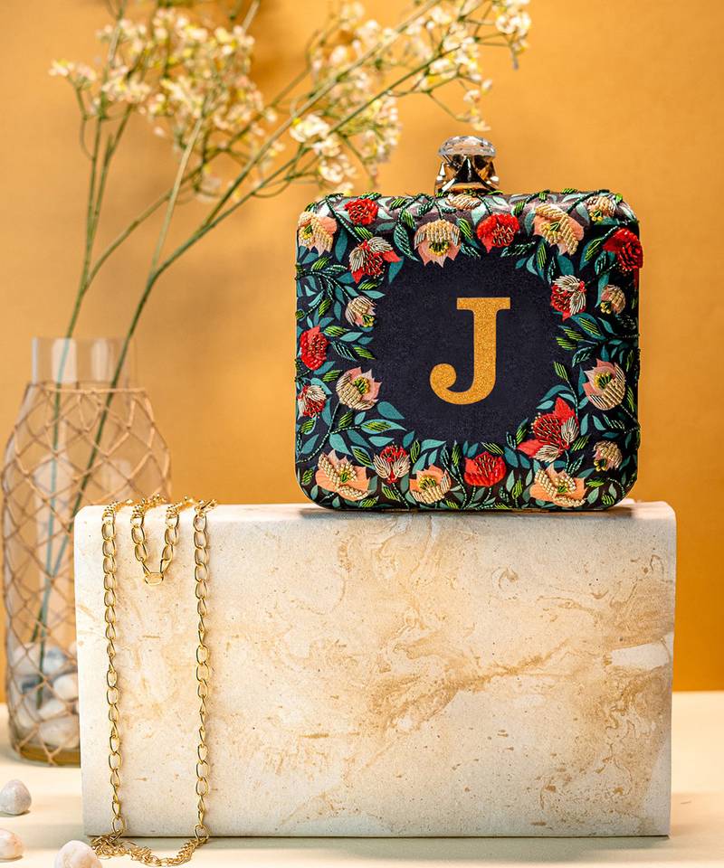 Blue floral embroidered customised 'J' clutch