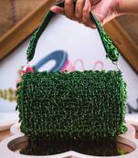 Green embroidered clutch