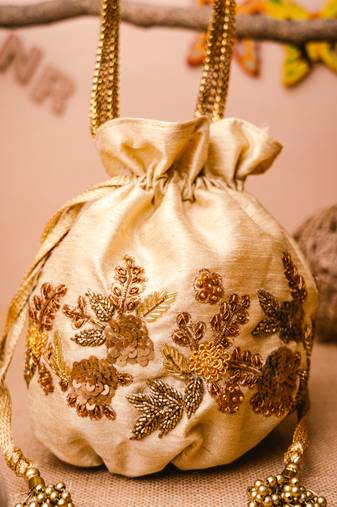 Beige floral embroidered potli bag