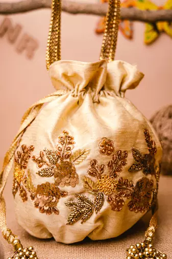 Beige floral embroidered potli bag