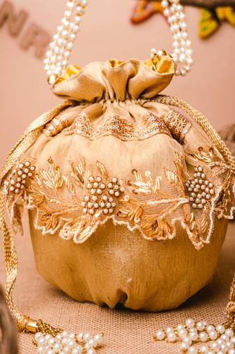Gold floral embroidered potli bag