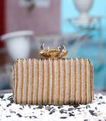 Gold sequin embroidered clutch