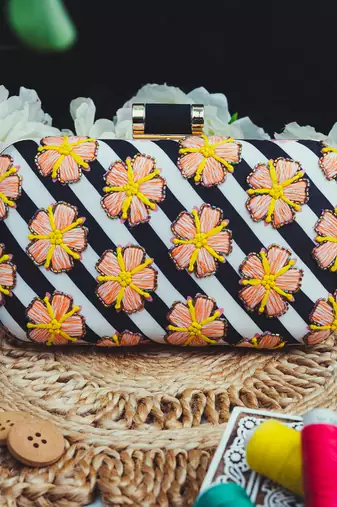 Black floral embroidered clutch