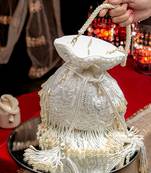 White floral embroidered potli bag