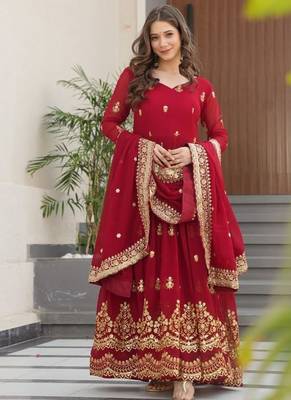Faux blooming designer gown is luxury clothing considered to be high quality made by zari thread & sequins embroidery 1