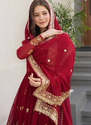 Faux blooming designer gown is luxury clothing considered to be high quality made by zari thread & sequins embroidery 3