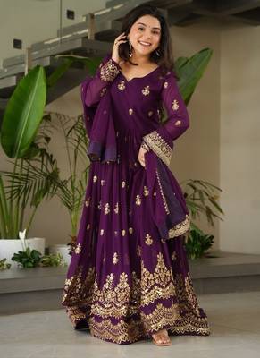 Faux blooming designer gown is luxury clothing considered to be high quality made by zari thread & sequins embroidery 1