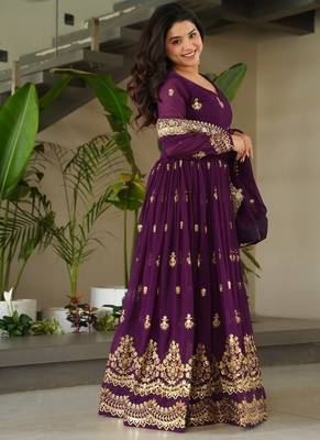 Faux blooming designer gown is luxury clothing considered to be high quality made by zari thread & sequins embroidery 3
