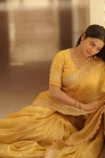 yellow embroidered designer silk blend saree