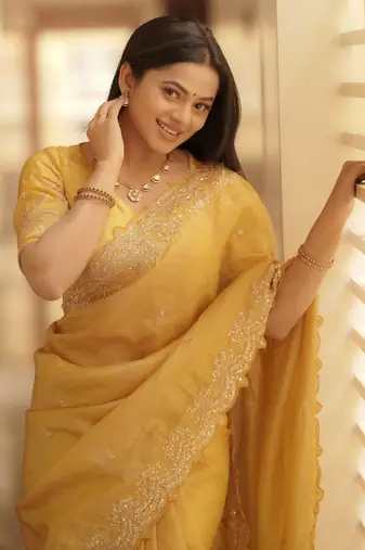 yellow embroidered designer silk blend saree
