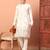 Off white heavy silk thread & zari embroidered band collar kurta pajama