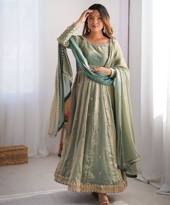 Mint green colour fendy silk embroidery work fully gown- full free size 1