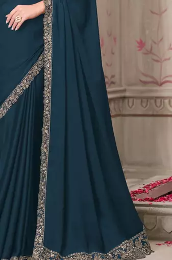 Teal green georgette embroidered bridal-saree